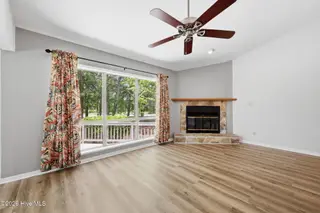 7601 Windward Drive, New Bern, NC 28560 – photo 5: Living Area with Fireplace