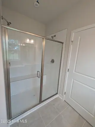 1276 Piper Glen Drive, Sunset Beach, NC 28468 – photo 15: Bathroom