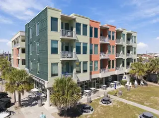 102 Cape Fear Boulevard Unit 301, Carolina Beach, NC 28428 — 1-bedroom condo in Towne Place Condominium, Carolina Beach, NC, photo 2 of 47: 2-web-or-mls-DJI_20260928123317_0509_D