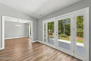 1122 Barkentine Drive, New Bern, NC 28560 – photo 17: Living toward dining