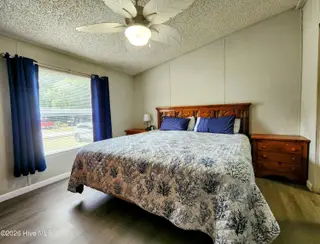 623 Sandy Bluff Drive SW, Supply, NC 28462 — 3-bedroom manufactured home in Sandy Bluff, Supply, NC, photo 8 of 26: Spacious Primary Suite