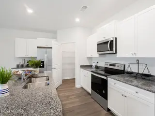 1519 W White Egret Lane NE Lot 756, Bolivia, NC 28422 – photo 10: BellaPoint20513kitDRHorton-009-004-1280x