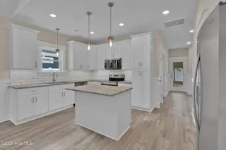 221 NE 75th Street, Oak Island, NC 28465 – photo 9: 221 NE 75th St-5