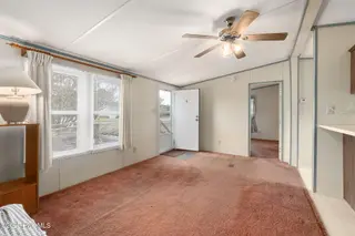 100 Lindsey Court, Beaufort, NC 28516 — 3-bedroom manufactured home in Green Meadows, Beaufort, NC, photo 15 of 38: Living Room from Bedroom