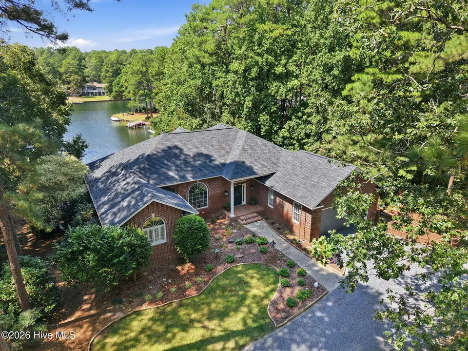 143 Harrell Road, Seven Lakes, NC 27376 – photo 1 of 72: 5-web-or-mls-DJI_20260904142146_0221_D