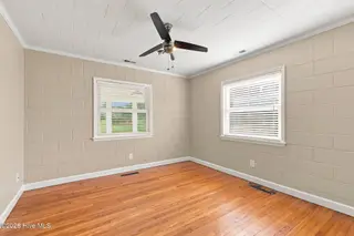 395 Nelson Neck Road, Sea Level, NC 28577 – photo 14: 10-web-or-mls-Bedroom_edited