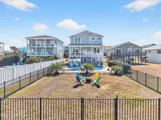 3228 E Dolphin Drive, Oak Island, NC 28465 – photo 9: KahunaPhoto.com-5