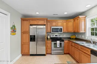 133 NE 3rd Street, Oak Island, NC 28465 – photo 4: Kitchen