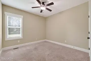 131 Nashville Drive, Archer Lodge, NC 27527 – photo 22: Downstairs - Bed 3
