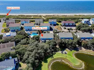 98 Foxfire Trace, Caswell Beach, NC 28465 — 3-bedroom townhome in Ocean Greens, Caswell Beach, NC, photo 2 of 66: 98FoxfireTrace - 74