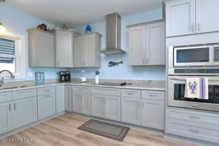 5207 E Pelican Drive, Oak Island, NC 28465 – photo 17: 5207 E Pelican Drive 16
