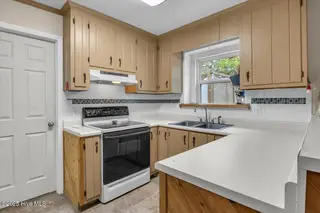 209 NE 56th Street, Oak Island, NC 28465 – photo 16: 26-Final 209 NE 56th St OKI-RJREM-9444