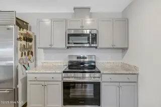 4901 Abbington Oaks Way SE, Southport, NC 28461 — 3-bedroom home in Groves at Southport, Southport, NC, photo 11 of 31: Kitchen