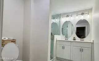 501 Shoreline Drive E, Sunset Beach, NC 28468 – photo 17: Primary bathroom