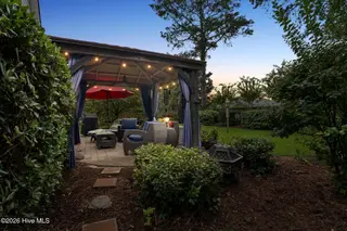 3140 Redfield Drive, Leland, NC 28451 — 3-bedroom home in Magnolia Greens, Leland, NC, photo 3 of 66: outdoor living