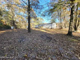 119 Edgewater Lane, Richlands, NC 28574 — 2-bedroom manufactured home in Chapel Ridge, Richlands, NC, photo 10 of 34: Backyard