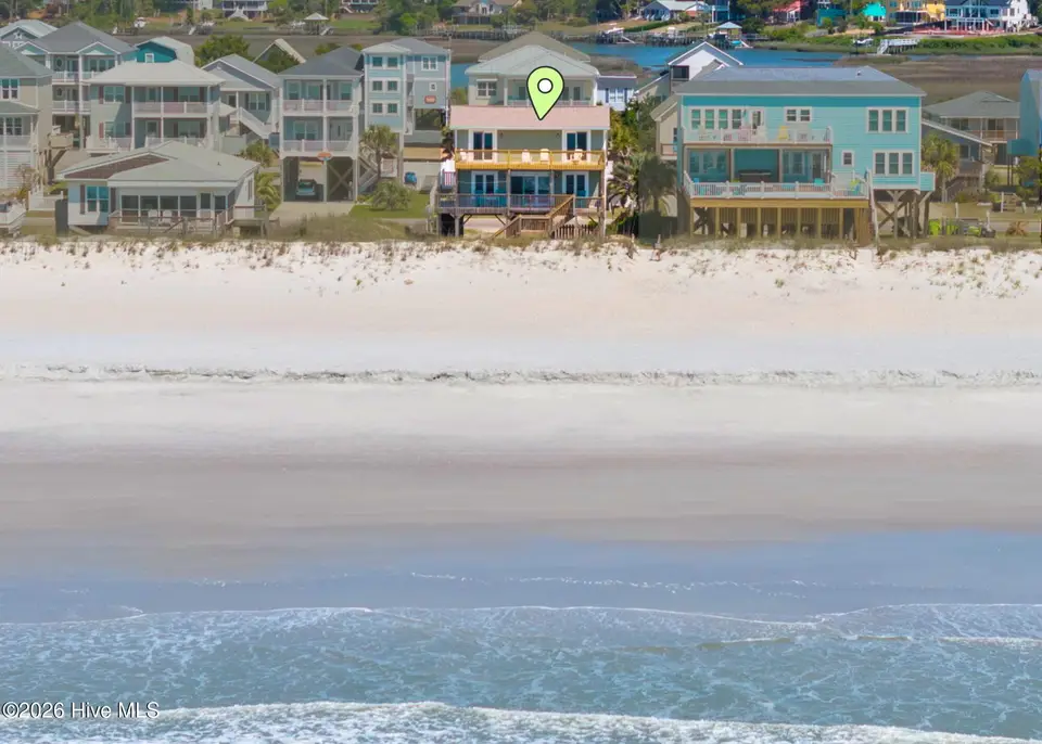 1717 W Beach Drive, Oak Island, NC 28465 – photo 1 of 60: Untitled design (17)