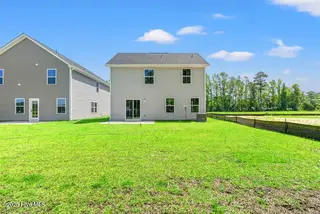 8027 Sterling Oaks Drive NW, Ash, NC 28420 – photo 5: Back Yard