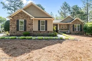 124 Juniper Creek Boulevard 16, Pinehurst, NC 28374 – photo 1: large-0197a74e-3311-715c-bbf3-e2d0e46e28