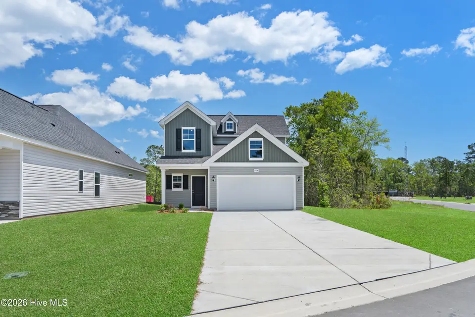 1734 Saucepan Bay Drive SW, Shallotte, NC 28470 – photo 1 of 37: Front Main Photo