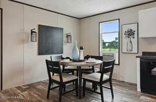 6795 Lewis Drive SE, Winnabow, NC 28479 – photo 17: Staged similar home
