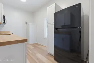 316 E Walter Street, Whiteville, NC 28472 – photo 20: New appliances and pantry cabinet!