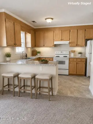 3803 Sterling Pointe Drive Q3, Winterville, NC 28590 – photo 3: Virtually Staged Kitchen