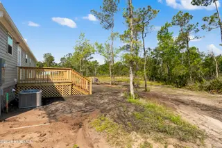 6830 Lewis Drive SE, Winnabow, NC 28479 – photo 4: Back yard