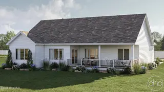 305 Planters Ridge Drive SW, Sunset Beach, NC 28468 — 3-bedroom home in Sea Trail Plantation, Sunset Beach, NC, photo 4 of 17: Rear Covered Porch