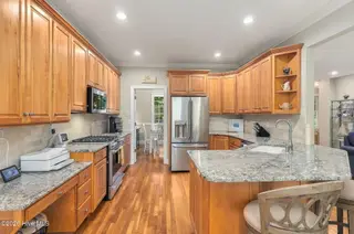 165 Cedar Lane, Newport, NC 28570 — 3-bedroom home in Gull Harbor, Newport, NC, photo 8 of 48: Kitchen with Breakfast Bar