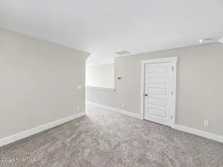 8615 Blue Haw Way Lot 125, Leland, NC 28451 — 3-bedroom home in Indigo Preserve, Leland, NC, photo 22 of 41: Upstairs Loft