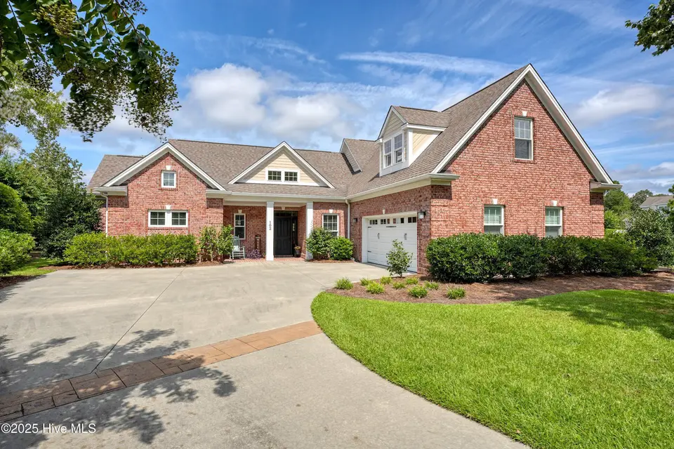 102 Reflection Court SW, Ocean Isle Beach, NC 28469 — 4-bedroom home in Ocean Ridge Plantation, Ocean Isle Beach, NC, photo 1 of 77: 001-100_a7409064_skyvue