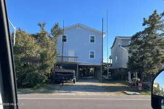 1097 Ocean Boulevard W, Holden Beach, NC 28462 – photo 2: 3-19-26 2