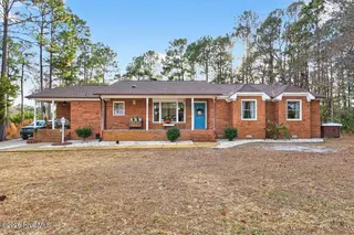 39 Country Club Drive, Shallotte, NC 28470 – photo 1: 39 Country Club Dr