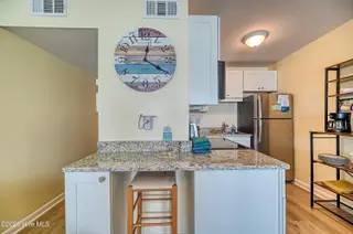 1822 New River Inlet Road Unit 1304a, North Topsail Beach, NC 28460 – photo 10: Kitchen 3