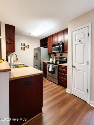1211 S Taylor Street, Goldsboro, NC 27530 — 2-bedroom condo in Willow Run, Goldsboro, NC, photo 5 of 13: 39BAD2C6-84F5-42A7-9257-C52EE8EFC22C