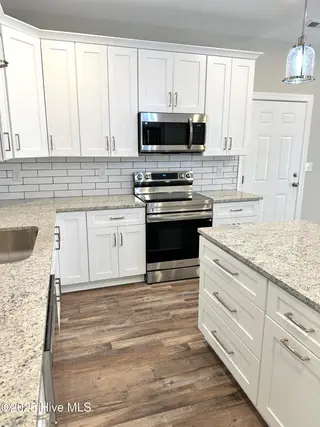 321 NE 52nd Street, Oak Island, NC 28465 – photo 17: IMG_4502