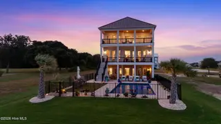 402 Kensington Place, Newport, NC 28570 – photo 3: Evening View of Home