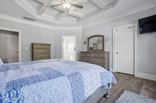 6476 Bryson Drive SW, Ocean Isle Beach, NC 28469 – photo 20: double door to ensuite