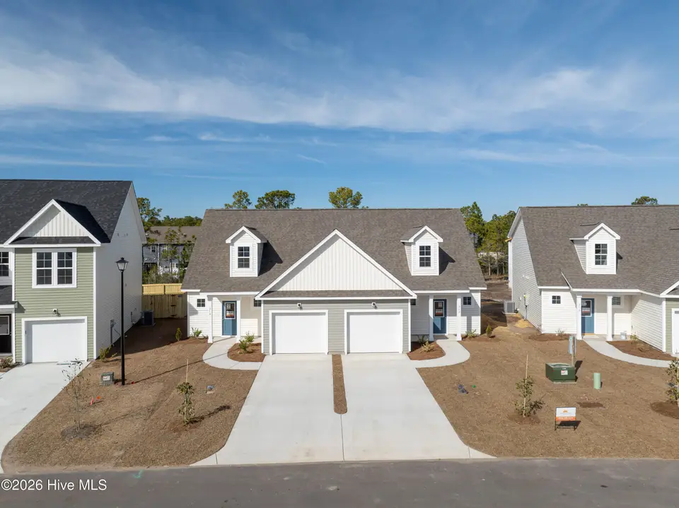214 Sandpiper Place, Holly Ridge, NC 28445 – photo 1 of 21: 212-214 Sandpiper - Exterior - Edited