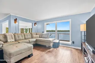 97 Lakeview Drive, Whispering Pines, NC 28327 – photo 12: Living Room with Lake Views