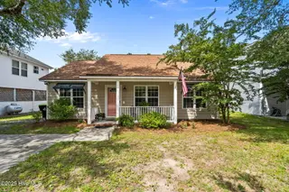 213 NE 48th Street, Oak Island, NC 28465 – photo 1: 1-web-or-mls-Photo Aug 21 2025, 11 29 30
