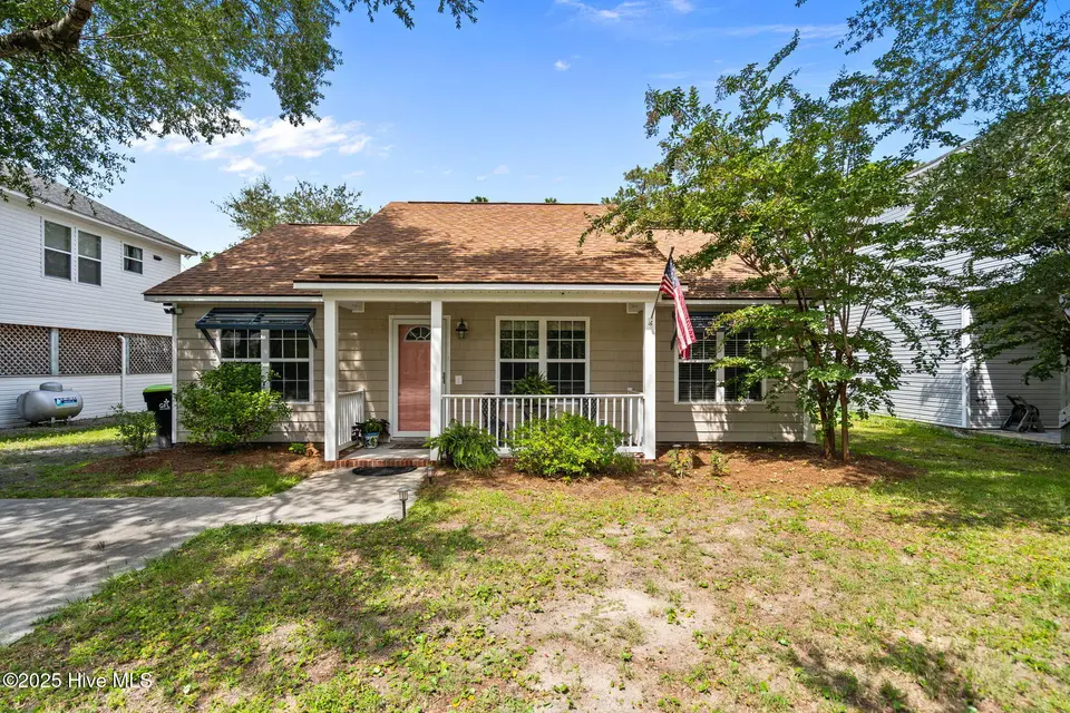 213 NE 48th Street, Oak Island, NC 28465 – photo 1 of 36: 1-web-or-mls-Photo Aug 21 2025, 11 29 30