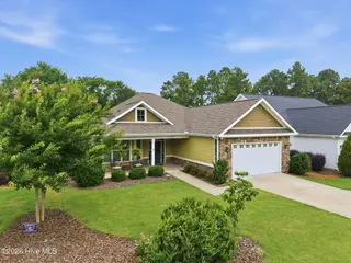 135 Heath Court, West End, NC 27376 – photo 1: 4-web-or-mls-DJI_20260623121301_0923_D