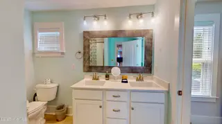305 Red Lewis Drive, Kure Beach, NC 28449 – photo 22: King Suite Bathroom Floor 1