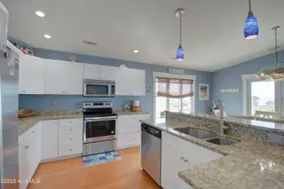 1404 E Dolphin Drive, Oak Island, NC 28465 – photo 15: 1440Edolphin - 27
