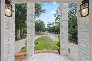 104 SW Yacht Drive, Oak Island, NC 28465 — 5-bedroom waterfront home, Oak Island, NC, photo 10 of 77: 6_front porch