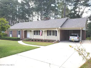 1113 Parkside Drive NW, Wilson, NC 27896 – photo 2: CARPORT VIEW FROM STREET
