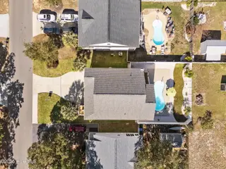 224 NE 58th Street, Oak Island, NC 28465 – photo 4: 5-web-or-mls-DJI_20251031141357_0313_D