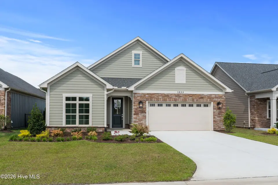1033 Northbridge Court NW, Ocean Isle Beach, NC 28469 – photo 1 of 66: Front Elevation